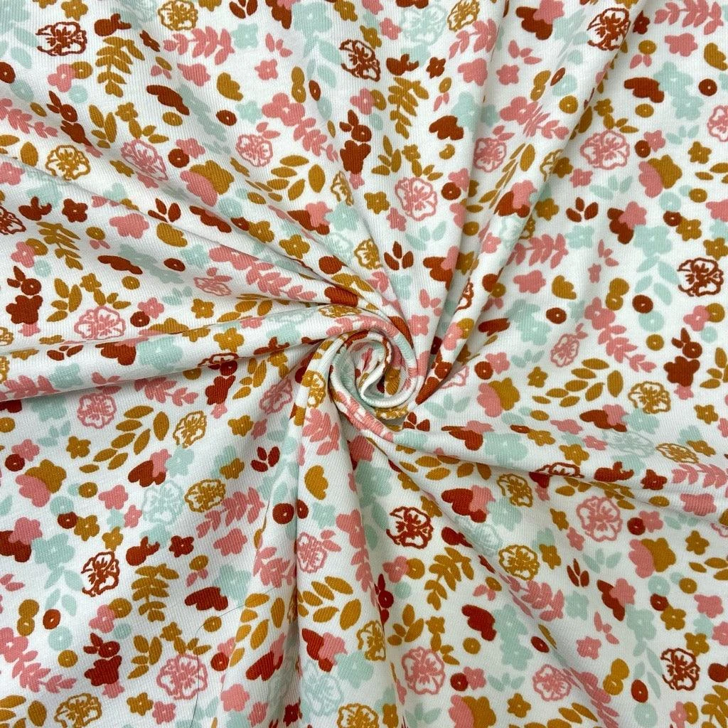 Mini Cartoon Flowers On White Cotton Jersey Fabric 1 Mini Cartoon Flowers On White Cotton Jersey Fabric
