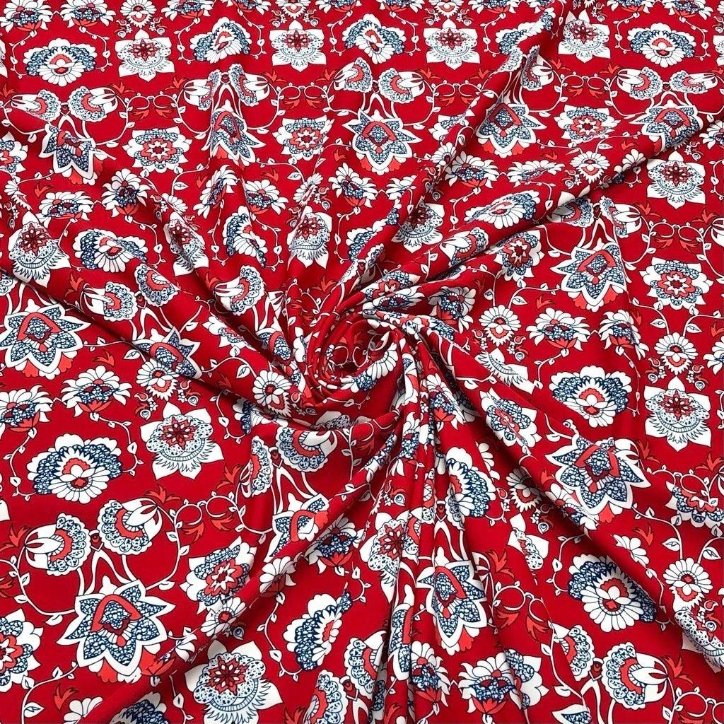 Blue And White Flower Shapes On Red Lycra Spandex Fabric 1 Blue And White Flower Shapes On Red Lycra Spandex Fabric