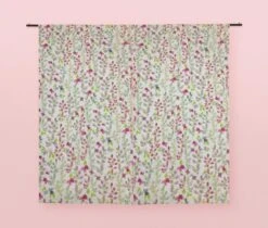 Watercolour Pink, Grey, Green Floral On Ivory Panama Fabric -Ernst Fabric Store mockup of a set of two blackout curtains at a studio 30102 9
