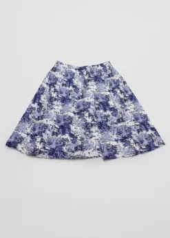 Distressed Print Crepe Fabric -Ernst Fabric Store mockup of a skater skirt flat laid over a surface m30573 1