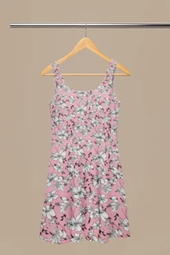 Large Flower Fields Crepe Fabric 15 Large Flower Fields Crepe Fabric -Ernst Fabric Store mockup of a sublimated skater dress placed on a wooden hanger m31084 2